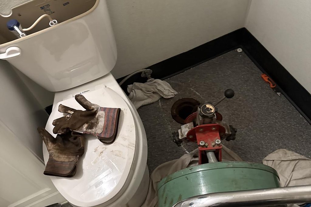 Toilet pulled to run the drain machine down the line