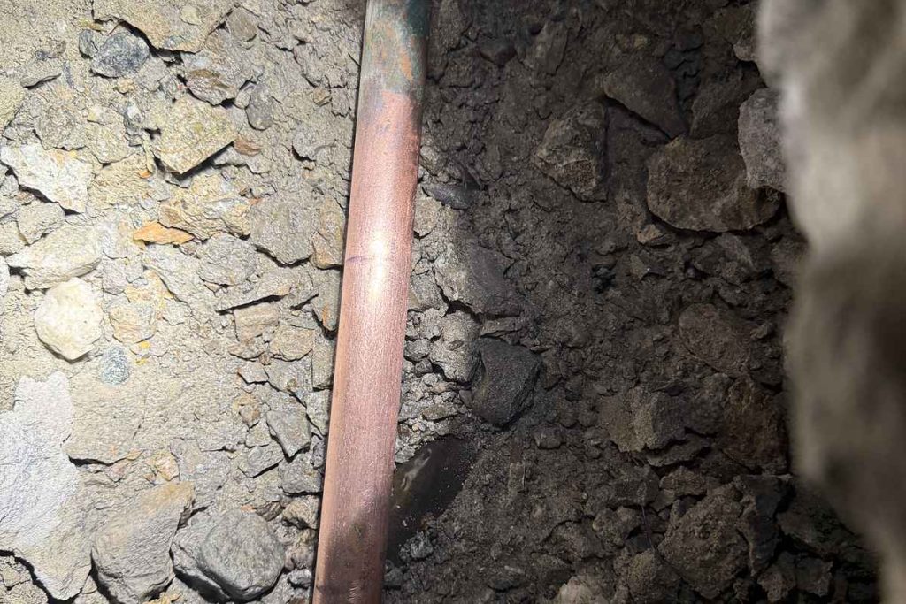 New copper pipe run through the under-slab trench