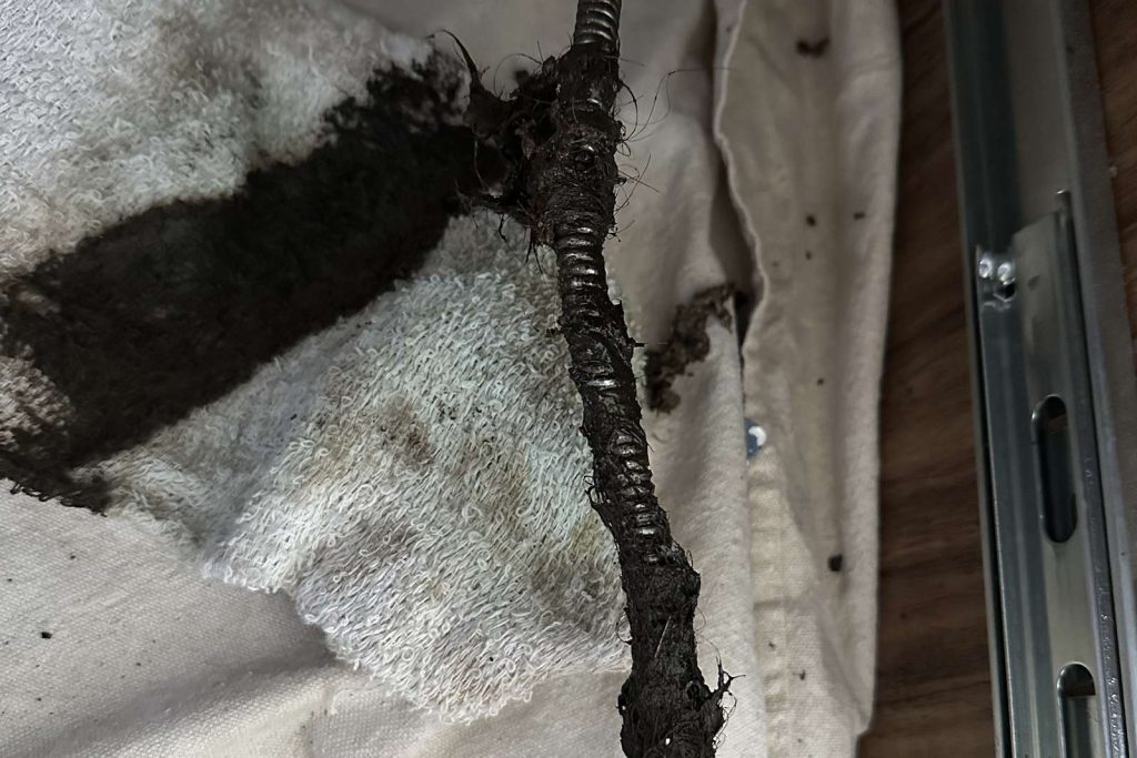 Drain cable pulled out loaded with the clog it cleared