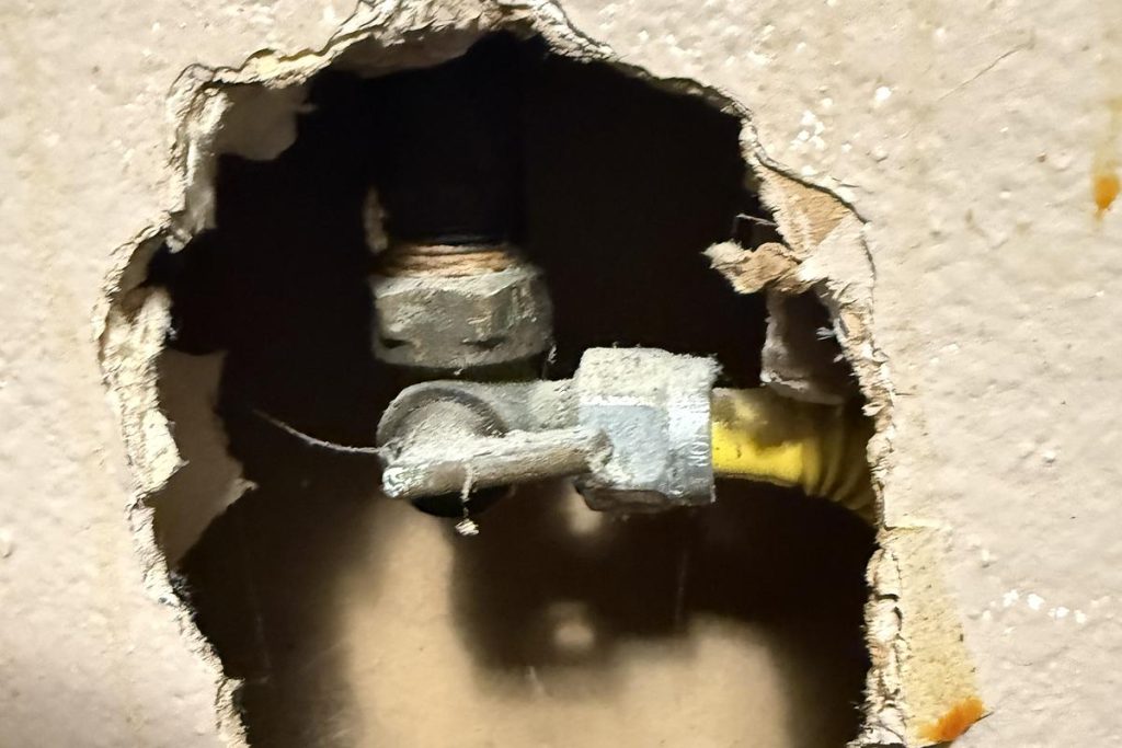Wall opened at the leak point found during testing