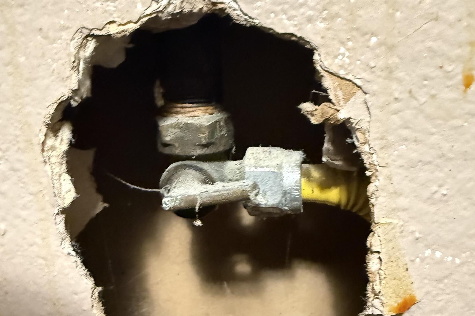 Wall opened at the leak point found during testing