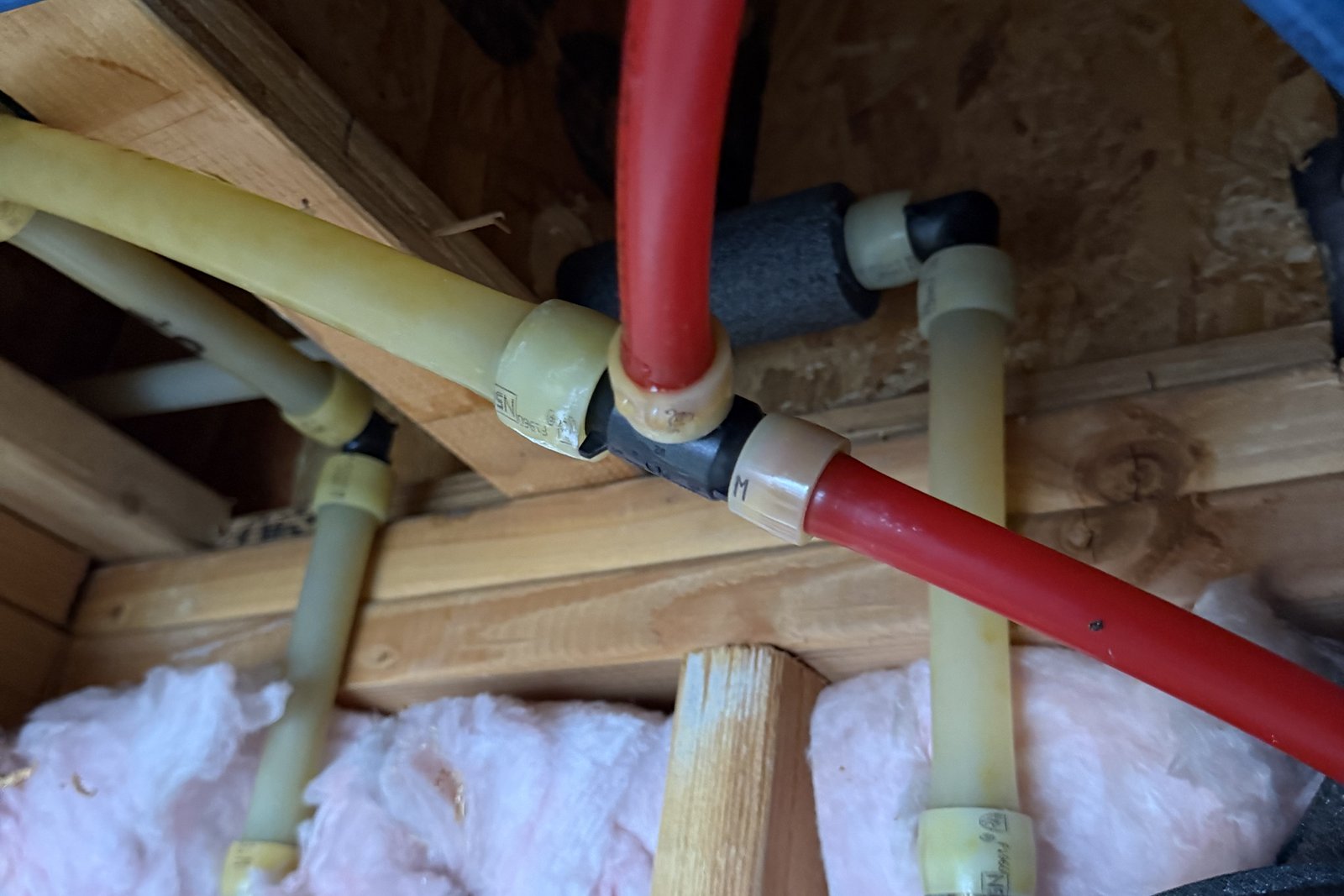 New PEX water lines installed through the framing
