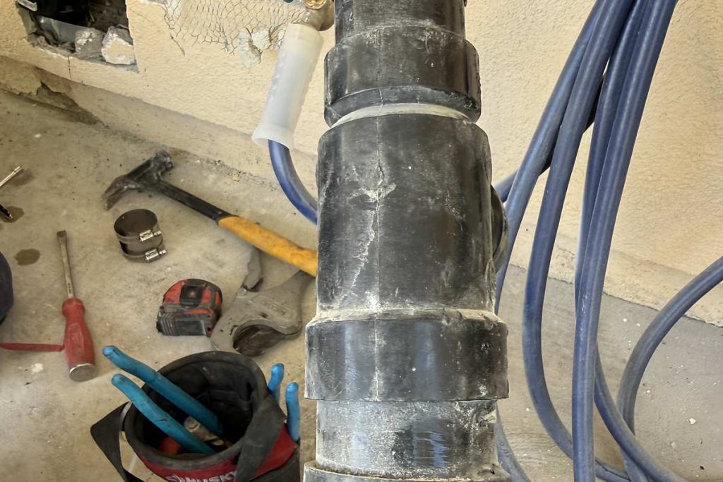Old drain fitting removed during a sewer repair