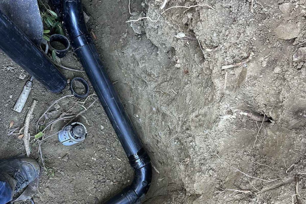 New ABS sewer line installed in a trench