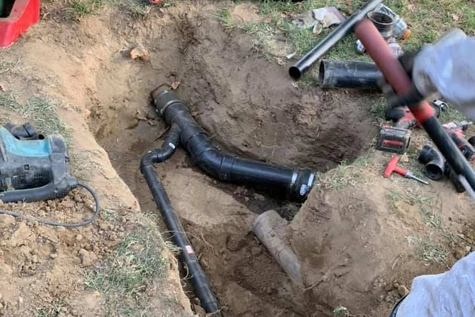 New sewer line being laid in an open trench