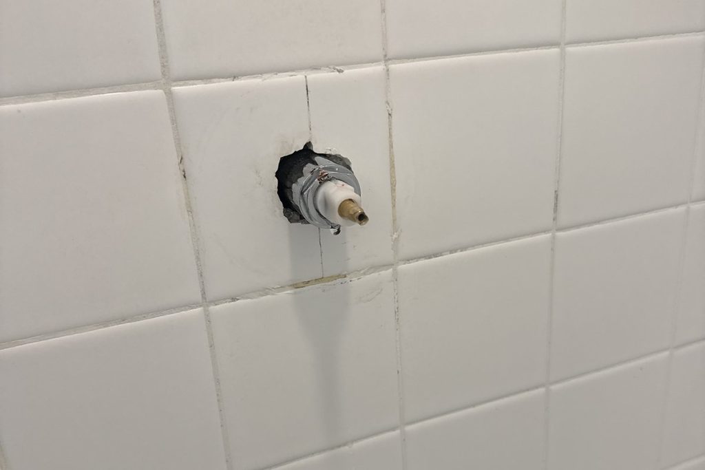 Shower valve stem replaced behind the tile
