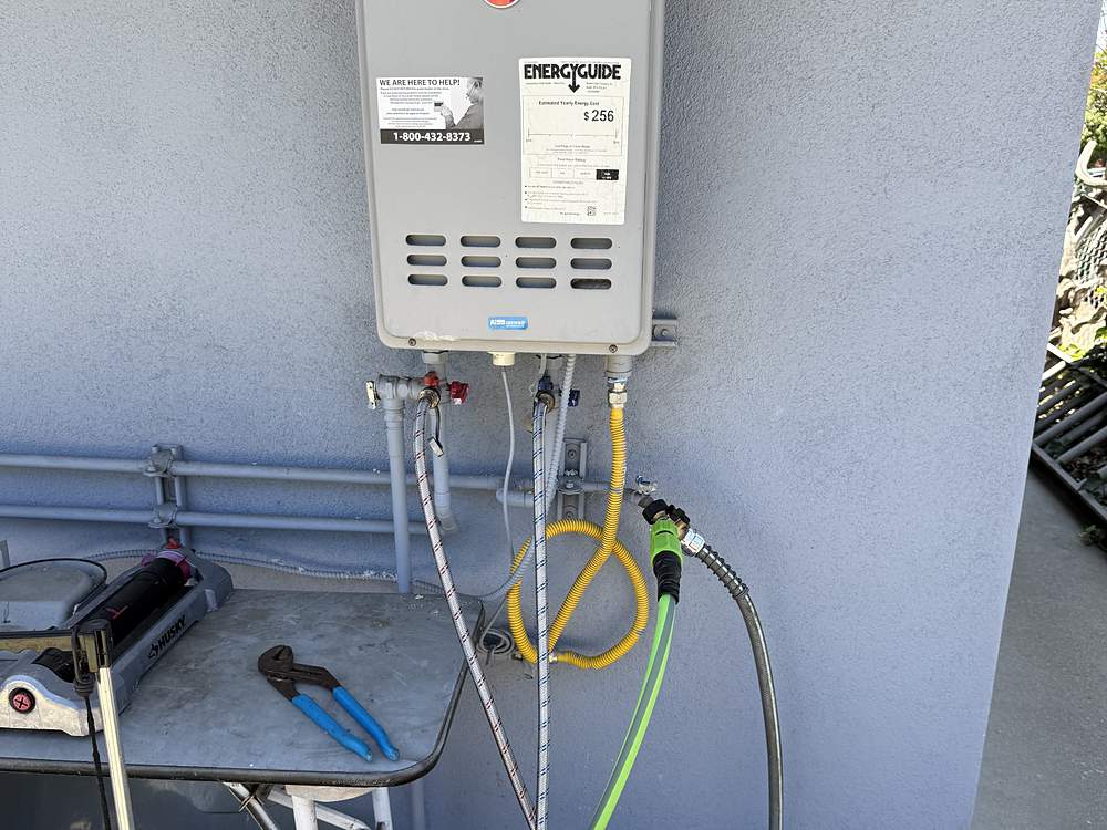 Rheem tankless water heater connected for a descaling flush