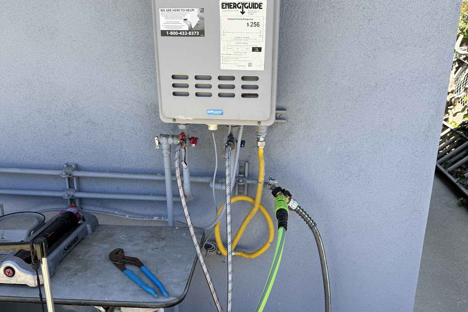 Rheem tankless water heater connected for a descaling flush