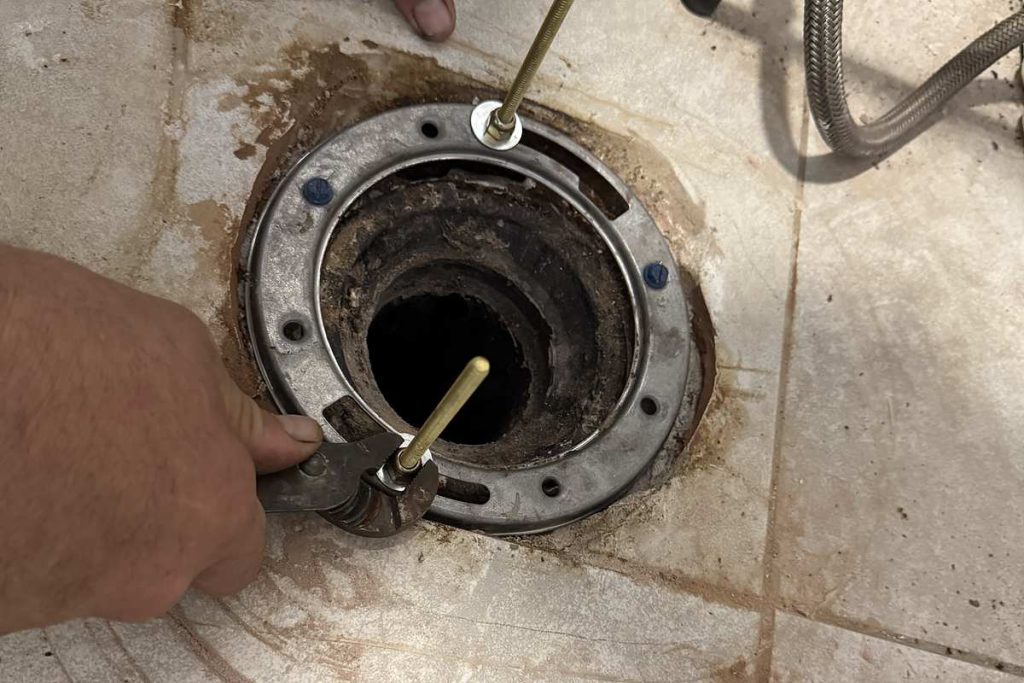 Closet flange prepared for a new toilet