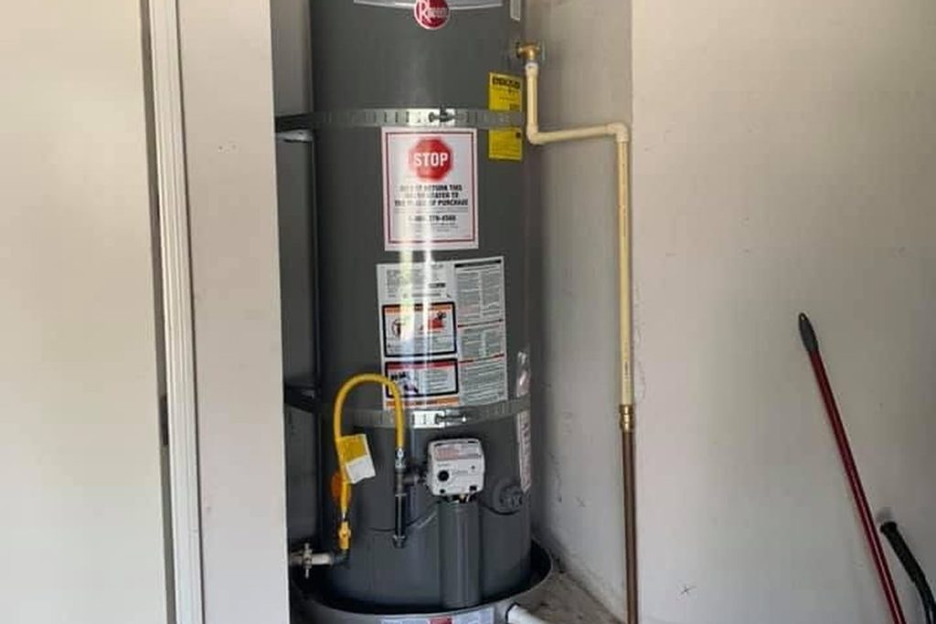 Newly installed gas water heater in a garage